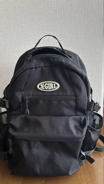 X-GIRL OVAL LOGO BACKPACK