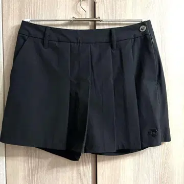 여성용 블랙 플리츠 팬츠