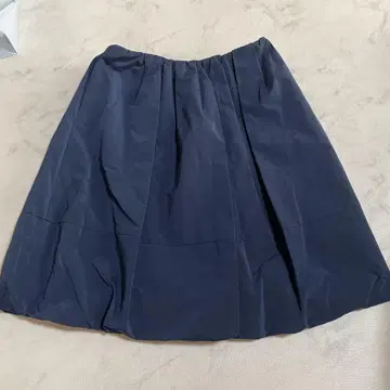 LOUNIE 네이비 플레어 스커트