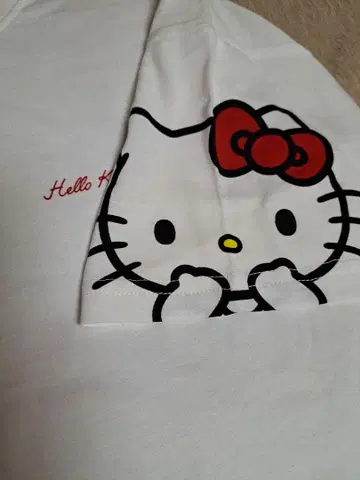 헬로키티 HELLO KITTY 화이트 티셔츠 양쪽 소매 키티 페이스