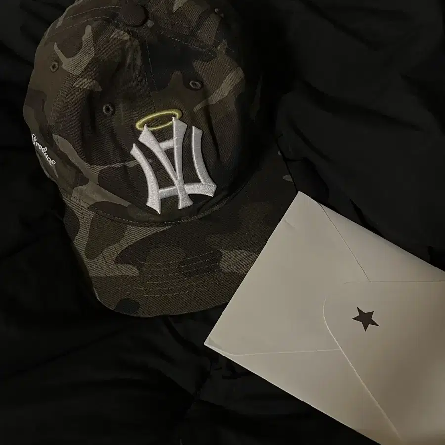 aeae Hat AE SYMBOL ANGEL WING CAP [CAMO] on Bunjang Global Site.