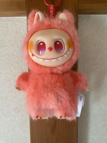 오렌지 컬러 퍼 캐릭터 봉제 인형