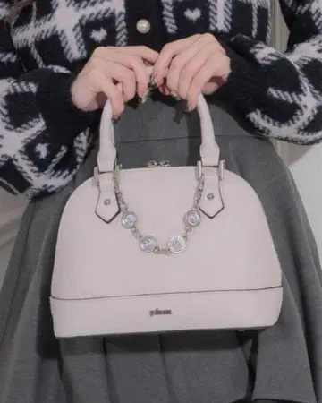 pium 비쥬가 장식된 pium 모노그램 미니 백 페일 핑크
