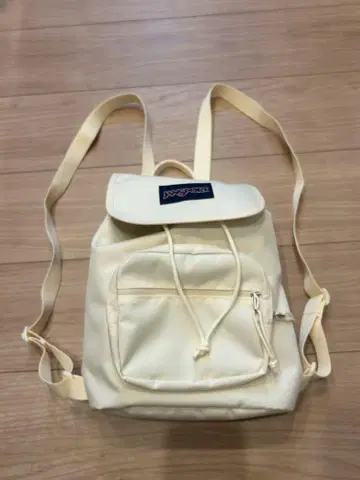 JANSPORT 크림색 백팩