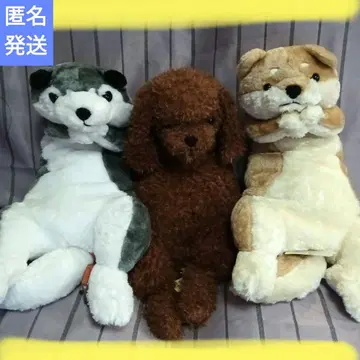 강아지 누워 있는 봉제 인형
