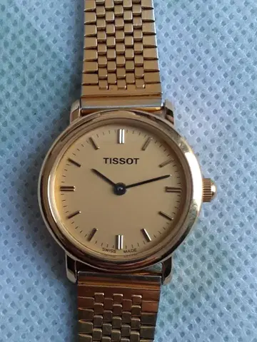 TISSOT 골드 아날로그 손목시계