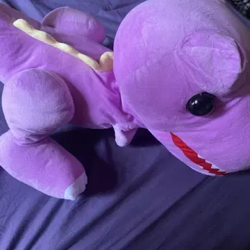 보라색 공룡 봉제 인형
