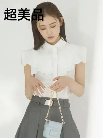 초미품 릴리 브라운 슬리브리스 블라우스