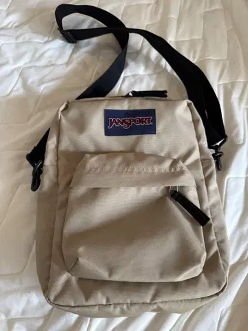 잔스포츠 JANSPORT 콜팩스 크로스바디 베이지
