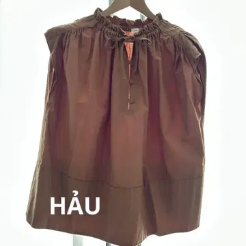 HAU 슬리브리스 상의
