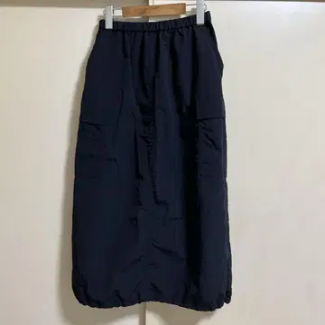 Ada. 밑단 드로스트 벌룬 밀리터리 스커트