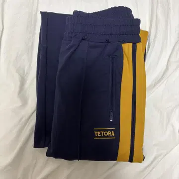 TETORA 네이비/골드 트랙 팬츠