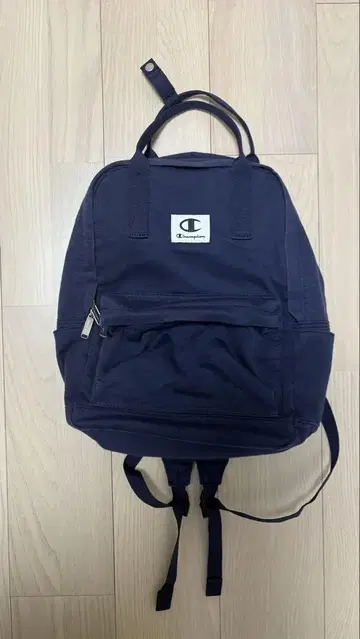 Champion 네이비 백팩