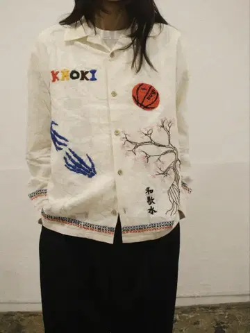 KHOKI Hand embroidered-design shirts