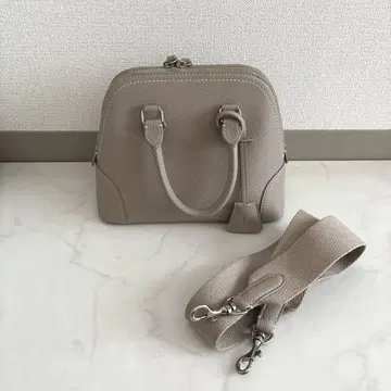 Mila owen 와이드 숄더 보스턴백 베이지