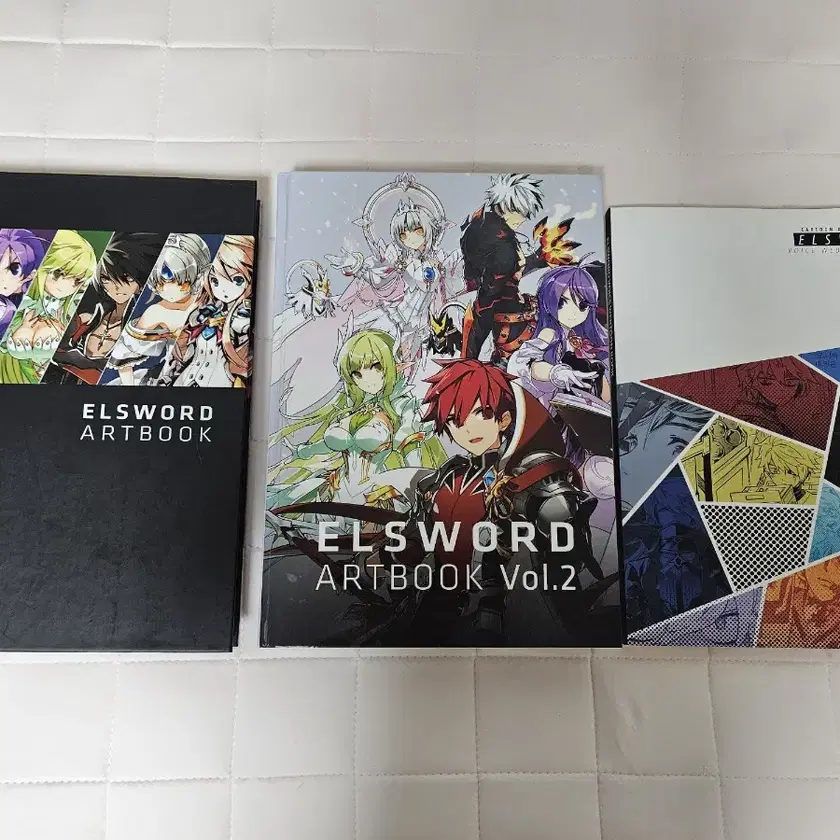 Elsword Art Book Volume 1 + Volume 2 on Bunjang Global Site.