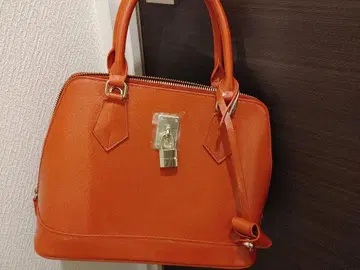 오렌지 핸드백 금속 락 포함