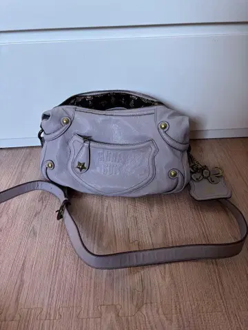연보라 가죽 숄더백 ANNA SUI