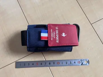 LE COQ SPORTIF 카라비너 포함 파우치