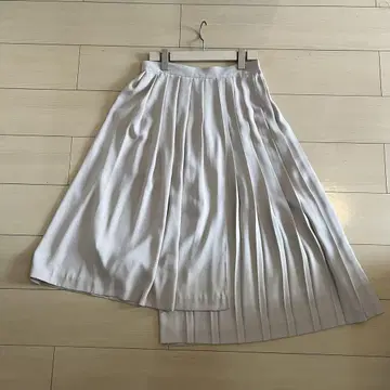 DAMA 라이트 베이지 플리츠 스커트