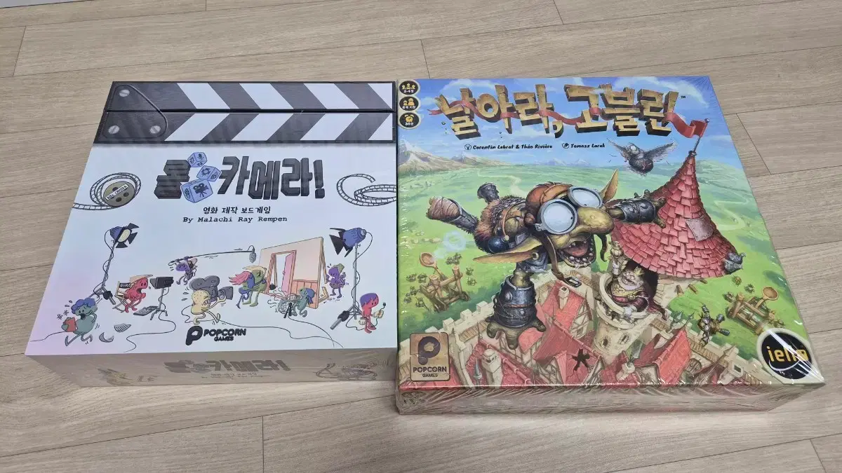 Roll Camera: A Cooperative Movie-Making Board Game for 4 Players