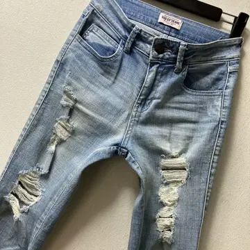 GUESS 여성용 스트레치 데미지 밑단 지퍼 데님 스키니