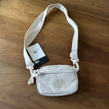 THE NORTH FACE 크림색 사코슈