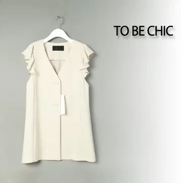 934 새상품 TO BE CHIC 트리아세 더블 크로스 프릴 베스트 40