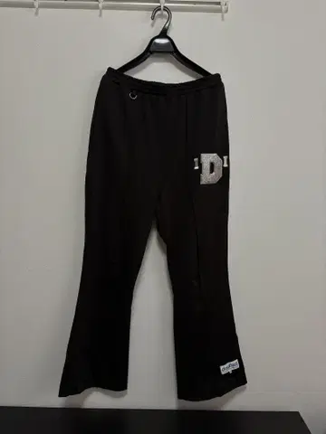 CUSTOMIZED METAL LETTER TRACK PANTS