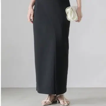 NEUNA 허리밴딩 커브 랩 롱 스커트 블랙