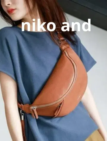 [새 상품] 니코앤드niko and 브라운 합성 피혁 바디백, 태슬 포함
