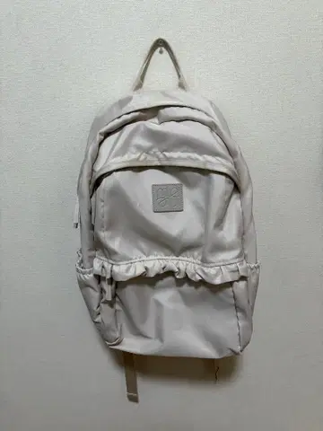 멜로우 네온 프릴 백팩 아이보리