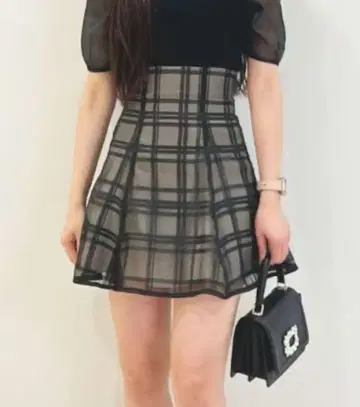 MERCURYDUO 시어 체크 백 레이스업 미니스커트 바지