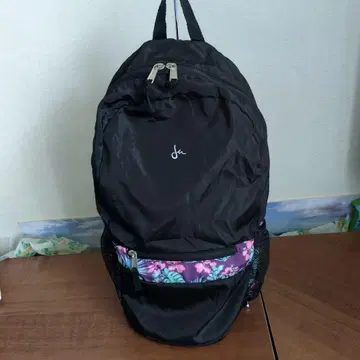 새상품급 블랙 백팩 하와이안 패턴