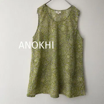 ANOKHI 슬리브리스 블라우스