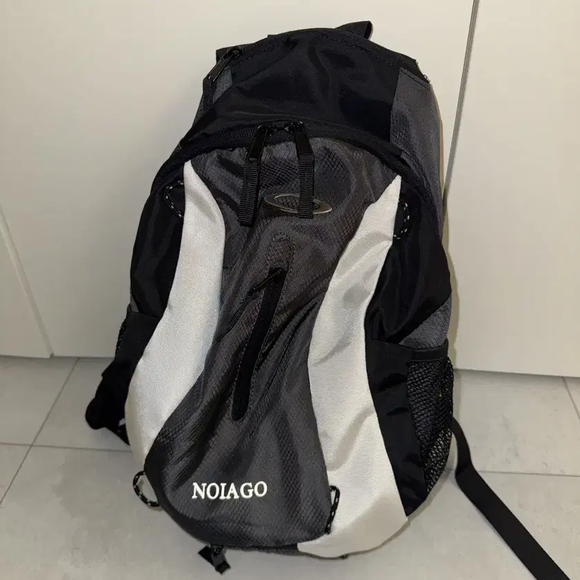 Noiago Multi Logo Backpack on Bunjang Global Site.