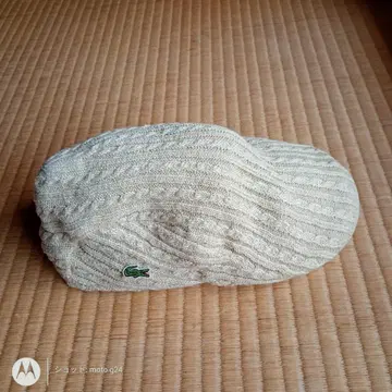 라코스테 케이블 짜임 니트 모자 크림색