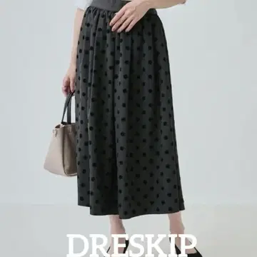 DRESKIP 도트 무늬 플레어 롱 스커트