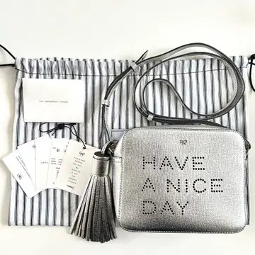 안야 힌드마치 실버 숄더백 HAVE A NICE DAY
