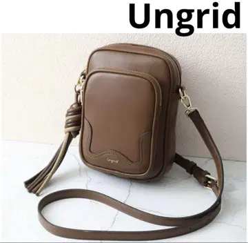 [Ungrid/언그리드] 트위스트 태슬 세로형 숄더백