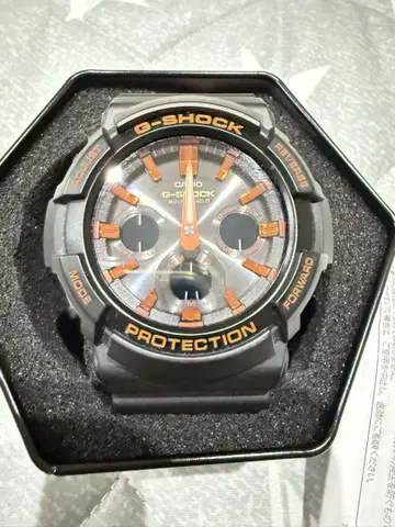 G-SHOCK GA-2000 블랙/오렌지 전파 오토 라이트 솔라 배터리