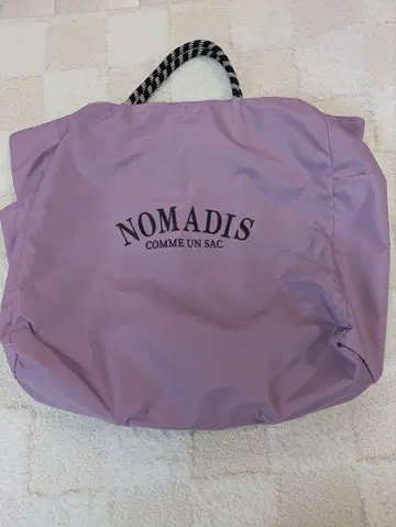 [새상품급 중고] Nomadis 핸드백 라벤더 컬러