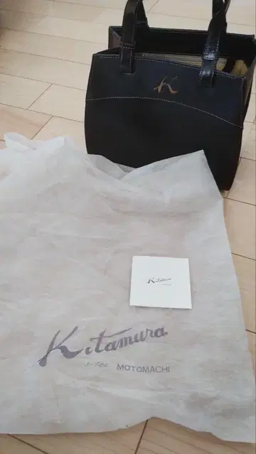Kitamura 블랙 가죽 핸드백