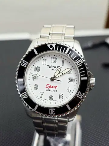 TM030 TISSOT Sport 100M/330FT