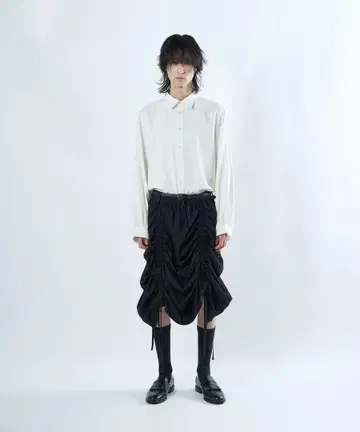 NOT CONVENTIONAL string skirt