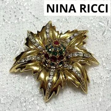 VINTAGE NINA RICCI gold flower brooch