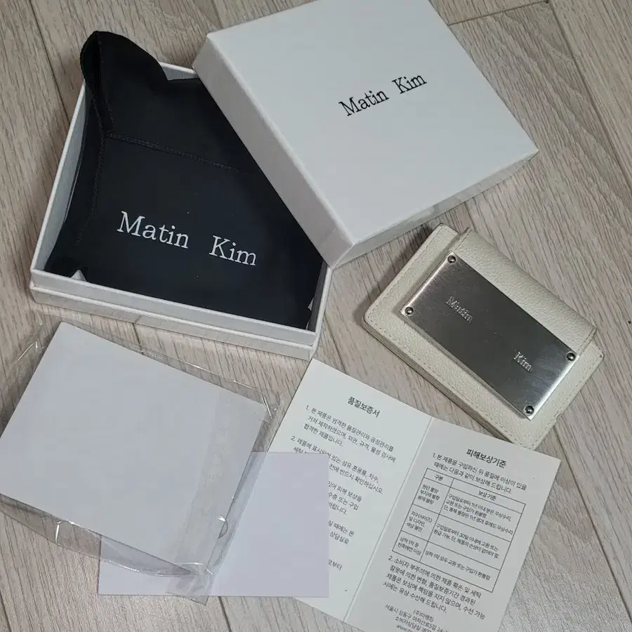 MATIN KIM | 마뗑킴 Matin Kim Beige Quilted Accordion Card