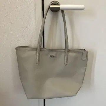 라코스테 아이보리 백