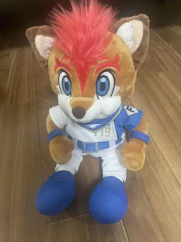 앉은 봉제 인형