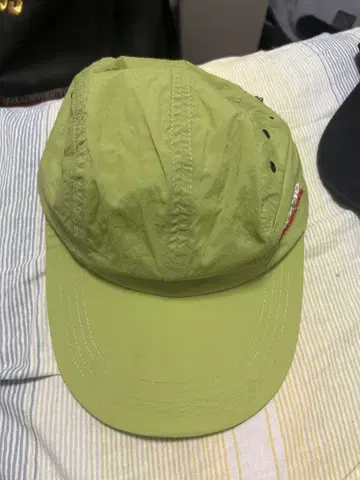 HUFLAND 라이트 그린 캡